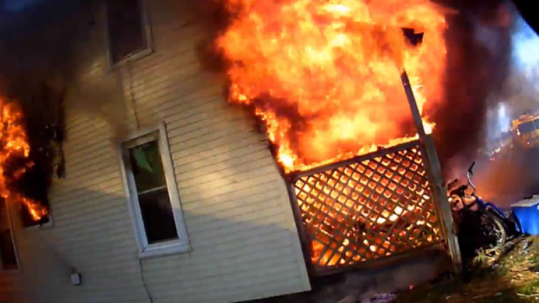 Watch Firefighters Battle Intense House Fire