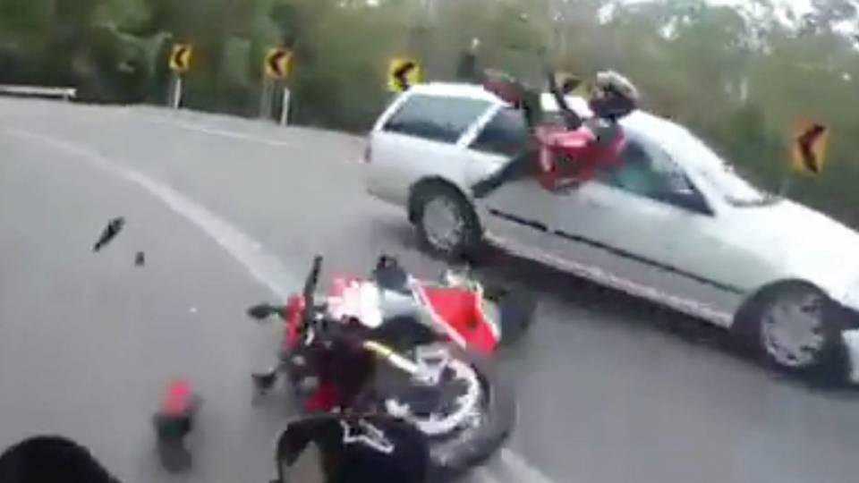 Crazy Video Shows Biker Trapped Under Car After Scary Crash RTM