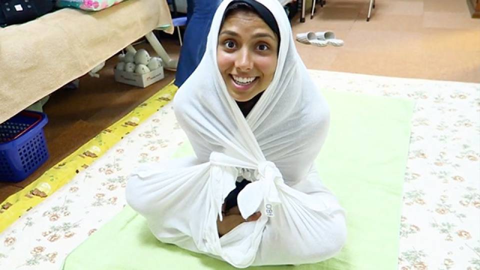 Adults Try New Japanese Swaddling Trend RTM RightThisMinute