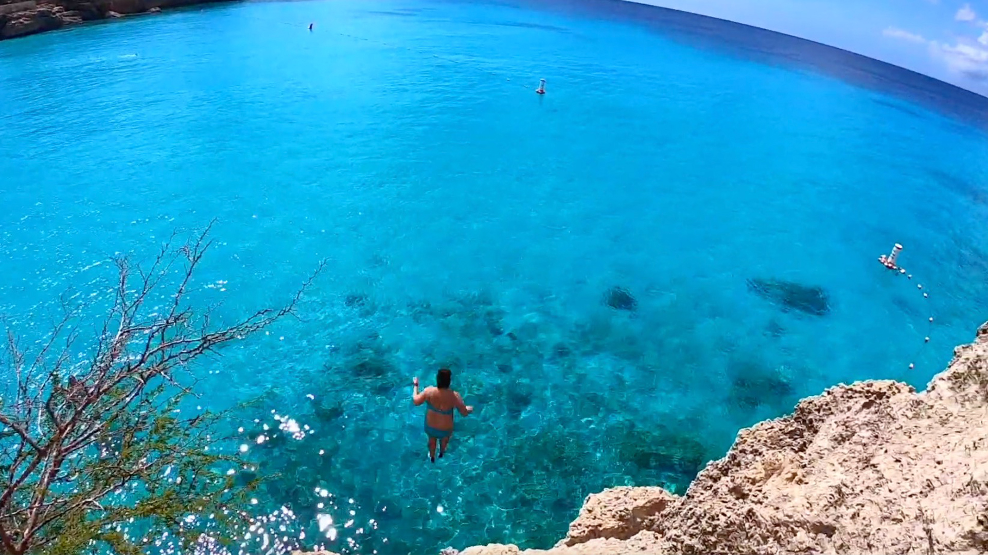 Cliff Jumping Into Crystal Clear Waters In Curaçao RTM RightThisMinute
